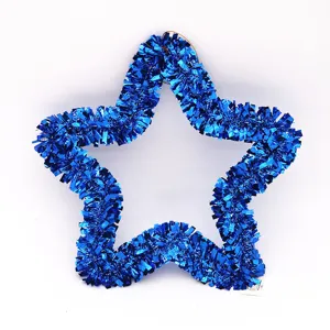 Close-up detail of a 35cm blue tinsel star hanging ornament for festive Christmas decoration