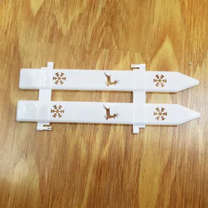 White PVC decorative Christmas tree fence featuring hollow snowflake and reindeer designs