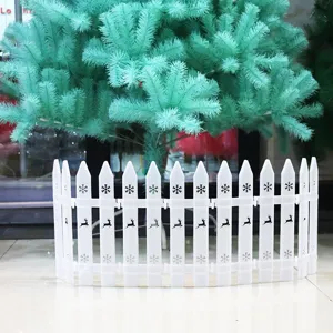 Decorative white PVC Christmas tree fence featuring reindeer and snowflake hollow designs