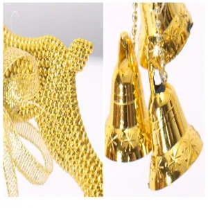 Macro detail showing a textured golden beaded reindeer ornament and bells with star patterns