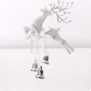 Detailed view of silver reindeer ornament with three metallic bells for Christmas trees