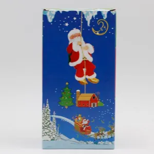 Detalle de cerca del colorido embalaje festivo para una muñeca de Papá Noel musical