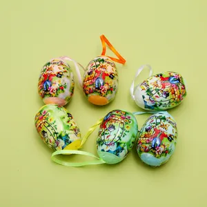 Detailed view of colorful Easter egg ornaments with cute cartoon rabbit patterns and ribbons.