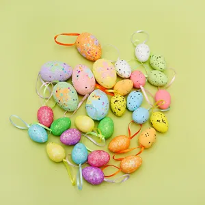 Detail view of various colorful Easter egg ornaments with hanging ribbons