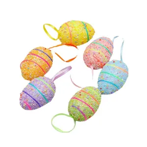 Set of 6 colorful DIY Easter egg ornaments with textured bead surface and ribbons.