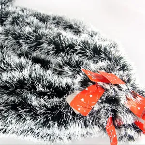 Festive 2-meter dark green and white snowy Christmas tinsel garland for tree decoration