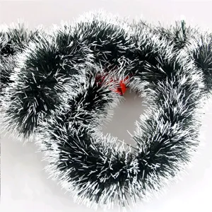 Festive dark green Christmas tinsel garland with white snowy tips for 2m holiday decor
