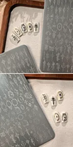 Detail showing intricate vintage badge patterns on TG-043 nail stamping plate