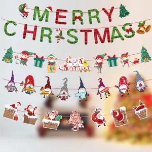 Vista dettagliata di vari striscioni natalizi in carta con elfi, gnomi e Babbo Natale decorativi.