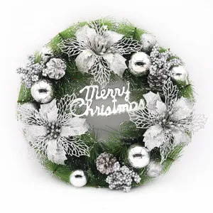 Close-up of 40cm silver Christmas wreath with poinsettia flowers and pine cones
