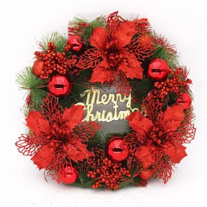 Close-up detail of a vibrant red 40cm Christmas wreath with gold Merry Christmas sign