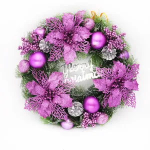 Close-up view of 40cm Christmas wreath with purple glitter flowers and Merry Christmas sign