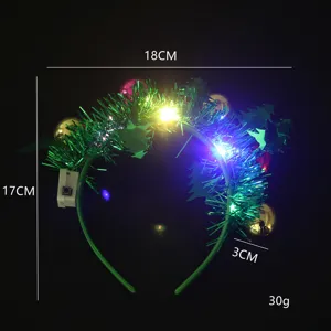 Detailed view of green Christmas tinsel headband with LED lights and 18x17cm dimensions