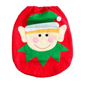 Cute red and green Christmas toilet lid cover with elf face design for holiday decor