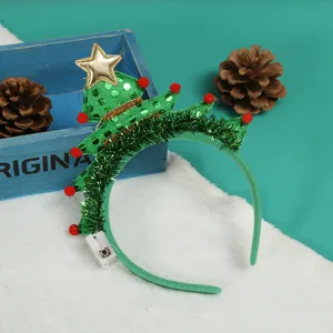 Festive green Christmas tree headband with sequins and integrated LED battery pack