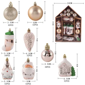 Uitgebreide kerstornamentenset in een huisvormige geschenkdoos met afmetingen.
