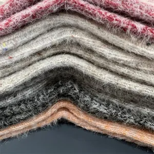 Merino wool fuzzy socks detail view, soft thermal winter socks texture, candy colors.