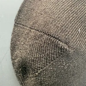 Merino Wolle Socken Detailansicht zeigt feine nahtlose Strickstruktur und warme atmungsaktive Qualität.