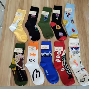 Stylish cotton mid-calf socks featuring unique artistic cartoon patterns and cute tags.