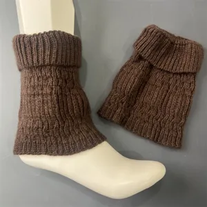 Detailed view of the brown ribbed knit slouch socks highlighting the cozy vertical texture.