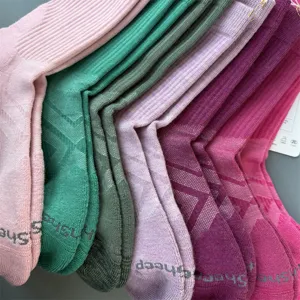 Merino wool crew socks for outdoor sports, breathable ribbed hiking socks in multi colors.