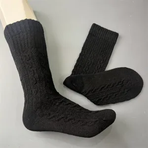 Comfortable black merino wool knit crew socks, ideal for outdoor hiking and daily wear.