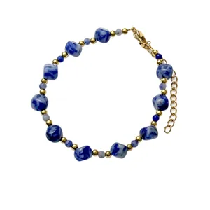 Blue and white marble bead bracelet with gold stainless steel accents and lobster clasp