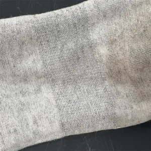 Merino wool blend socks detail, soft knit texture, breathable and comfortable fabric close-up.