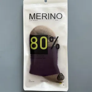 Details of 80% merino wool thick warm hiking socks packaged in frosted bag for outdoor sports.