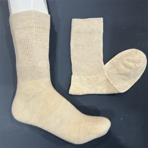 Close-up detail of women's merino wool socks, soft knit texture and ribbed cuff design.