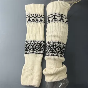 Retro Nordic style knitted thick wool leg warmers, detailed close-up showing winter warmth.
