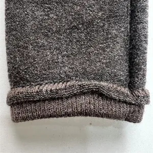 Detailed view of merino wool blend knitted socks, showing soft texture and ribbed cuff.
