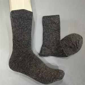 Detail view of women's merino wool crew hiking socks, showing soft knit texture and stretch.