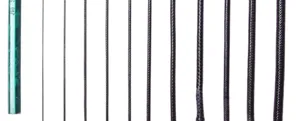 Detailed comparison of various thicknesses for black Korean wax cord using a pencil scale.