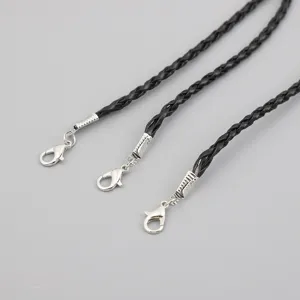 Detailed view of black braided cord necklaces with silver lobster clasps for DIY jewelry