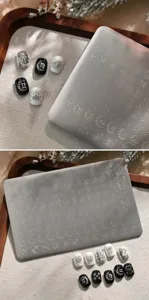 Macro view of TG-041 nail art stamping plate with detailed zodiac constellation engravings