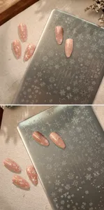 Detail of TG-039 nail art stamping plate with intricate snowflake and star designs