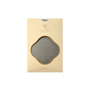 TENSOR TG-039 nail art stamping plate with snowflake patterns in elegant cream packaging