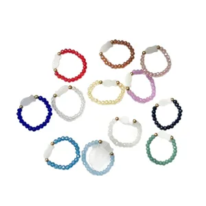 Set of 12 handmade colorful glass beaded stretch rings with white shell fish charms