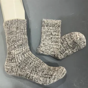 Cozy fuzzy knit wool-blend mid-calf socks detail showing soft texture and cozy warmth for winter.