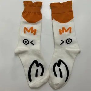 Retro cartoon cotton mid-tube women socks with cute graphic details and orange cuffs.