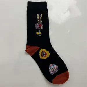 Cute vintage rabbit pattern detail on black cotton crew sock, cozy design with contrast heel.
