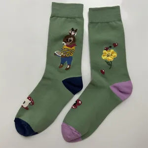 Green cotton socks detail, cute rabbit and mushroom knit pattern, vintage style hosiery.