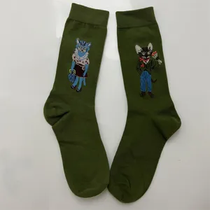 Green cotton mid-calf socks featuring cute retro fairy tale cat embroidery, cozy and stylish daily wear.