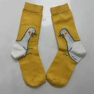 Cute yellow cartoon duck crew socks for women, soft cotton casual hosiery fashion daily wear.