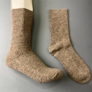 Detailed closeup view of merino wool ribbed socks, soft knit texture and comfortable daily fit.