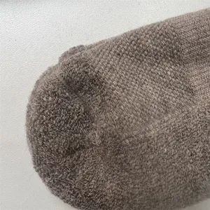 Merino wool thermal thick men's hiking socks detail texture, warm outdoor sport socks.