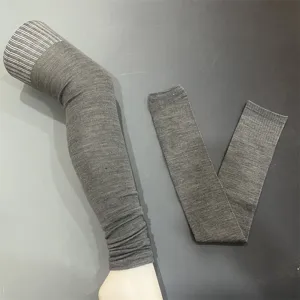 50% Merino wool leg warmers for women, anti-slip solid color long socks for knee warmth.