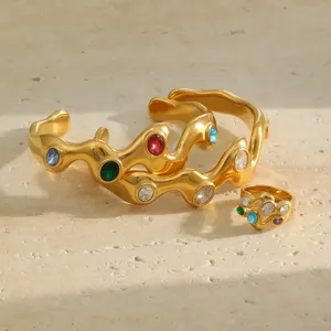 Luxury 18K gold plated stainless steel wave jewelry set with colorful crystals and ring.