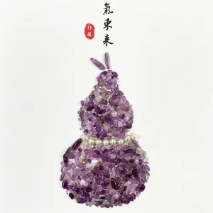 Detailed macro view of natural purple amethyst chips forming a gourd shape decoration